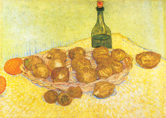 Basket with lemons and bottle